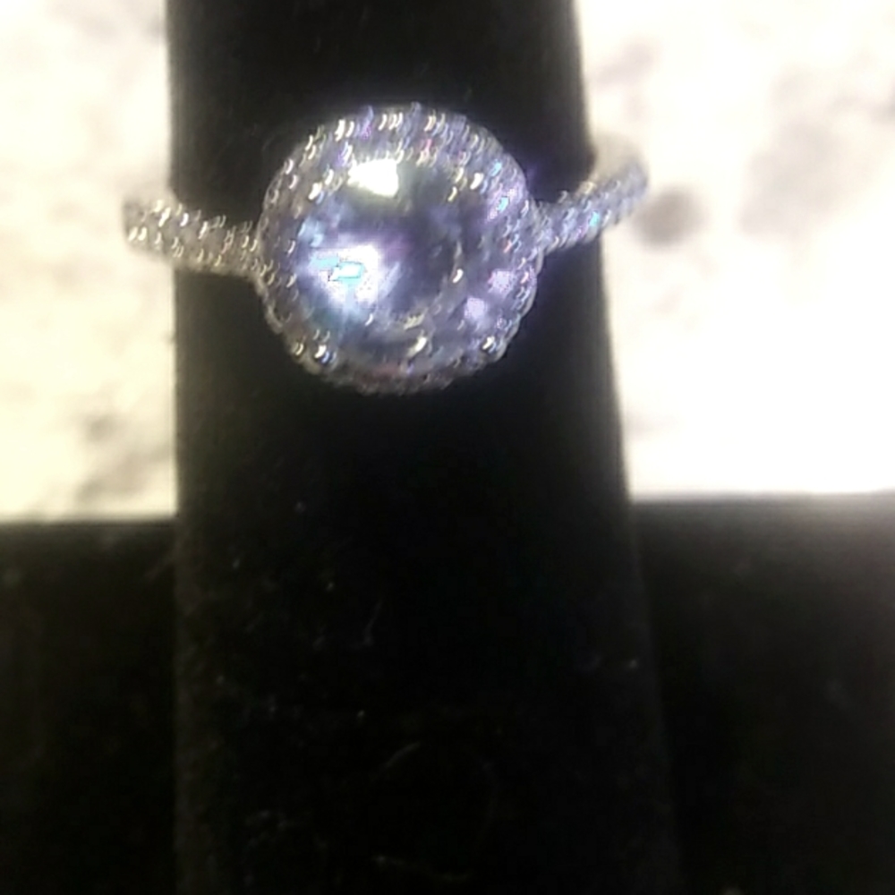1.15 CT Moissanite Adjustable ring .925 sterling